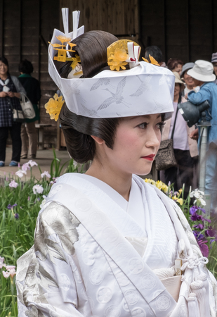 ITAKO, IBARAKI, JAPAN - JUNE 4TH 2016. Japanese bride in traditional costume during the annual Suigo Itako Iris Flower Festival.のeditorial素材