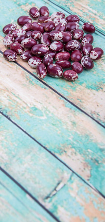 Pinto beans or speckled beans over wooden backgroundの写真素材