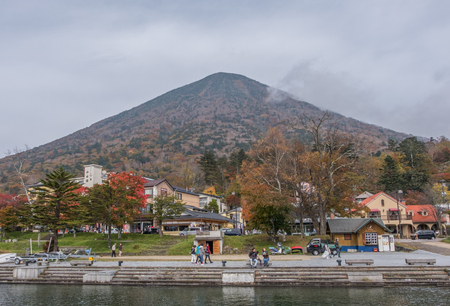 NIKKO, JAPAN - OCTOBER 22ND, 2016. Tourist enjoying the view at Nikko National Park, Japan. Nikko is the main tourist destination for locals and foreign tourist in Japan.のeditorial素材