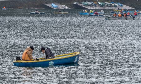 NIKKO, JAPAN - OCTOBER 23RD, 2016. Locals and tourist enjoying leisure boating activities at Lake Chuzenji. Nikko is the main tourist destination for locals and foreign tourist in Japanのeditorial素材