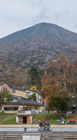 NIKKO, JAPAN - OCTOBER 22ND, 2016. Tourist enjoying the view at Nikko National Park, Japan. Nikko is the main tourist destination for locals and foreign tourist in Japan.のeditorial素材