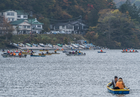 NIKKO, JAPAN - OCTOBER 23RD, 2016. Locals and tourist enjoying leisure boating activities at Lake Chuzenji. Nikko is the main tourist destination for locals and foreign tourist in Japan.のeditorial素材