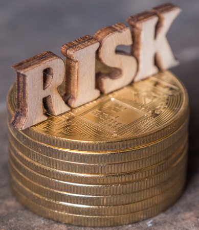Risk word on golden coinの写真素材