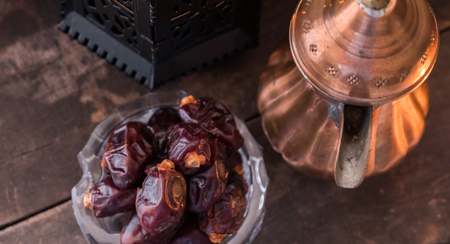 Dates fruits on wooden table top