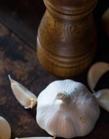 Garlic cloves on wooden boardの写真素材