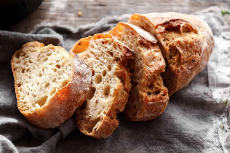 Homemade bread. Sliced bread on a linen napkin. homemade bakingの写真素材