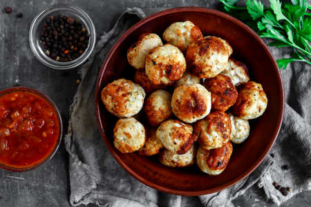 Chicken meatballs in a plate. Meatballs and basil. Copyspace. Top view.の写真素材