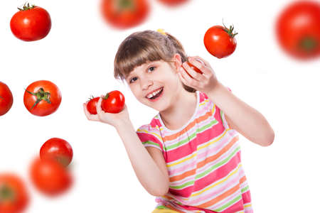 girl with tomato on white backgroundの写真素材