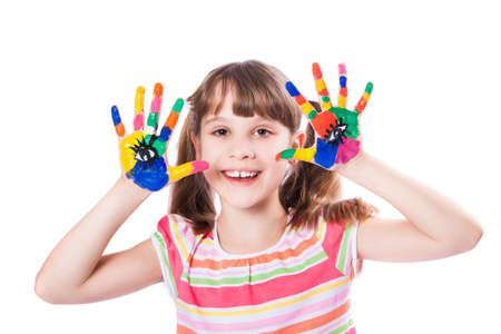girl with hands in paintの写真素材