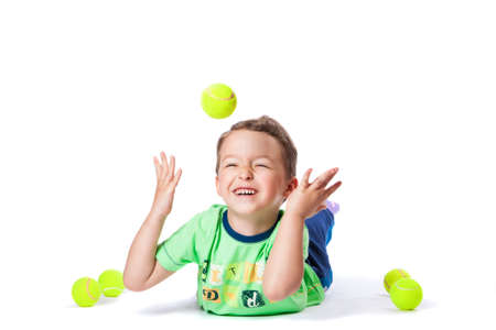 boy catches the ballの写真素材