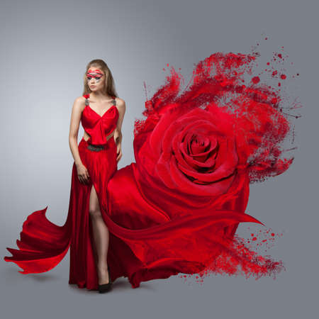 blonde in windy rose  dress. Beautiful girl with creative make-upの写真素材