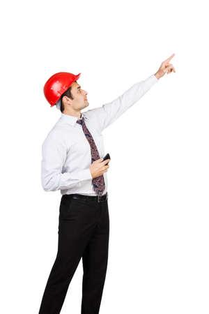 man engineer in a red helmet shows his handの写真素材