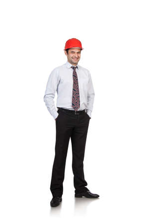 man engineer in red helmet standing on white backgroundの写真素材