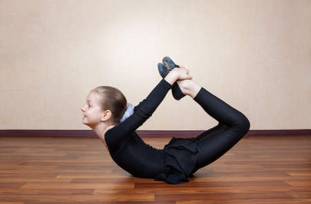 little girl gymnast trainsの写真素材