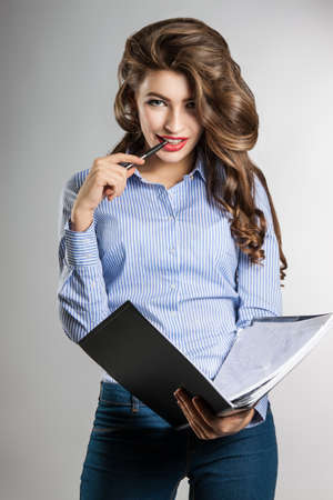 beautiful business woman with documentsの写真素材