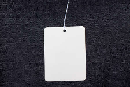 Cloth label tag blank white mockup. blue cloth. blank labelの写真素材