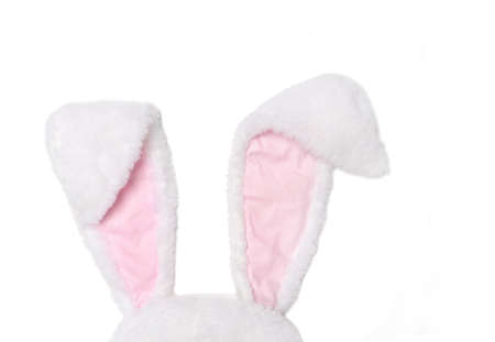 White and pink rabbit ears on white background. The concept of Easter. Flat ley