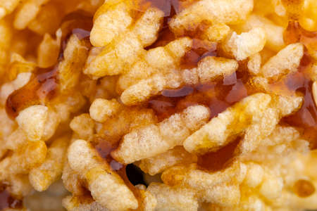 Thai dessert - rice cracker or rice biscuit topping with cane sugar closed upの写真素材