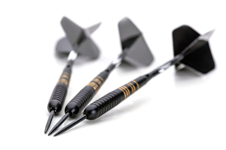 Three black darts are placed on a white background with the tips of the darts pointing in the same...