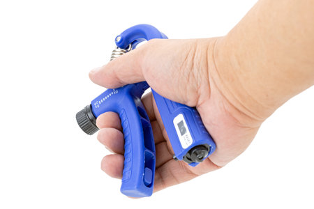Adjustable weighted hand squeezing exercise equipment isolated on white background.