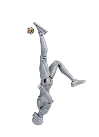 Attacker figurine performs dynamic somersault spike in sepak takraw, showcasing agility and balance. figure is mid air, emphasizing athleticism and motion against white backgroundの写真素材
