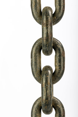 A close-up image of a heavy metal chain link with copy space isolated on white background,...