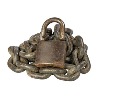 On a pristine white background lies a heavily rusted chain intertwined with a robust padlock,...