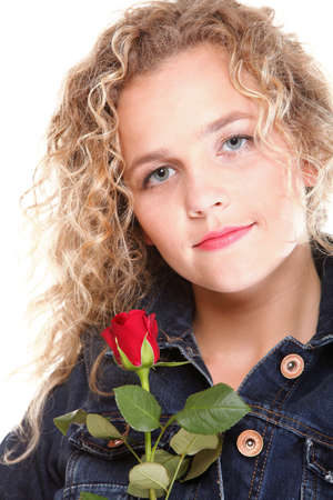portrait of attractive caucasian smiling woman blond isolated on white studio shot in red roseの写真素材