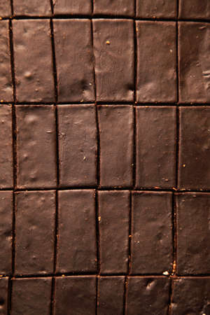 Chocolate cake with icing delicious food backgroundの写真素材