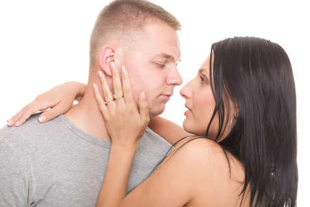 Loving embracing Portrait of a beautiful young happy smiling couple young relaxing
