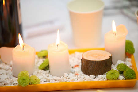 Romantic atmosphere with candle table settingの写真素材