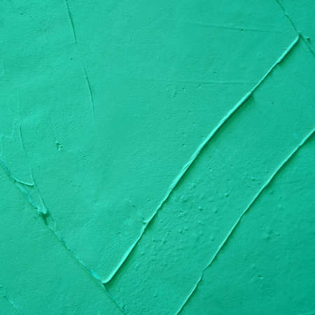 Grain green paint concrete wall grunge background or textureの写真素材