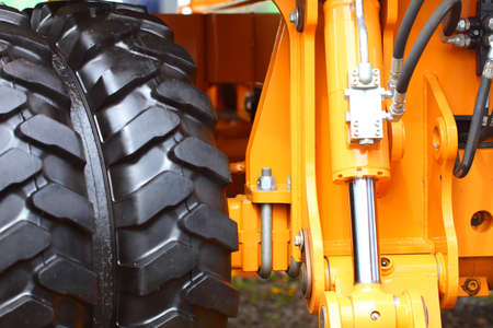 Detailed view of heavy vehicle big wheel of the building dozer or other construction machinery