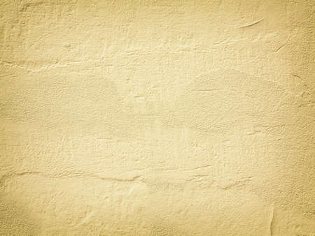 Yellow paint concrete wall background or texture