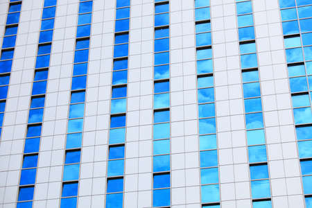 Modern architecture. Futuristic business corporate glass building, city background