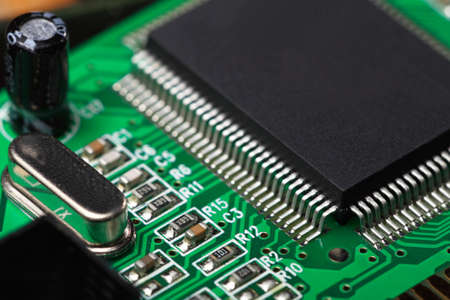 Printed Circuit Board with many electrical components, electronics computer part chip