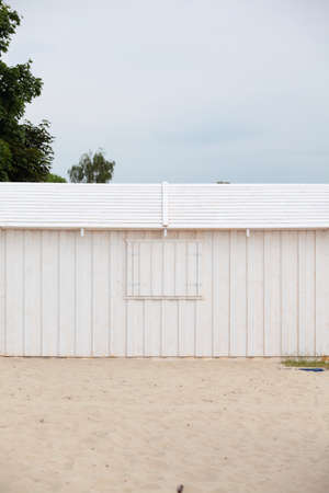 Wooden building house on beach. Window on wooden white houseの写真素材