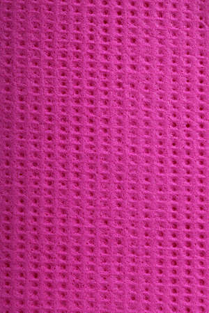 Pink kitchen sponge rubber foam as background textureの写真素材