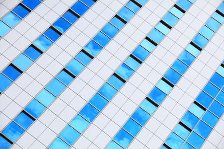Modern architecture. Futuristic business corporate glass building, city background