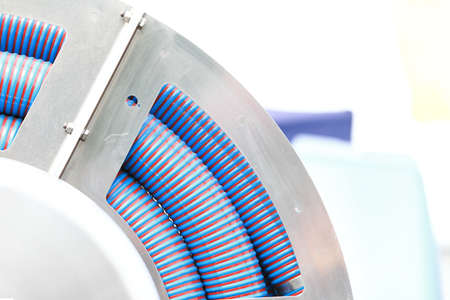 rolled up of blue plastic hose industrial detailの写真素材