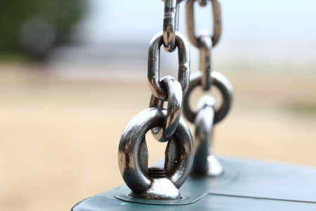 Empty swing set seesaw on playgroundの写真素材