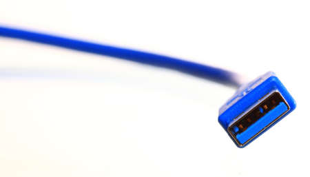 Blue USB cable isolated on whiteの写真素材