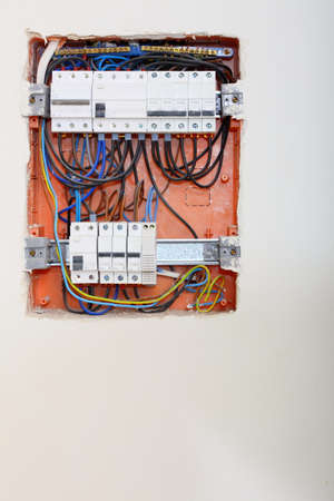 Electrical installation. Close up electrical panel electricity distribution box with wires fuses and...
