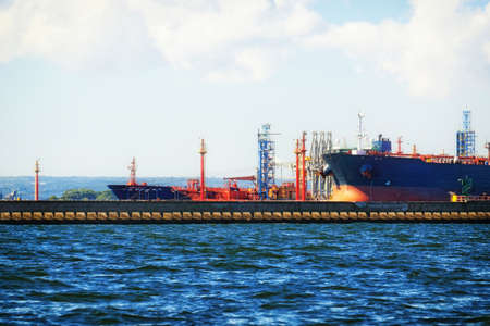 Loading container cargo ship in port Gdansk, Poland.の写真素材