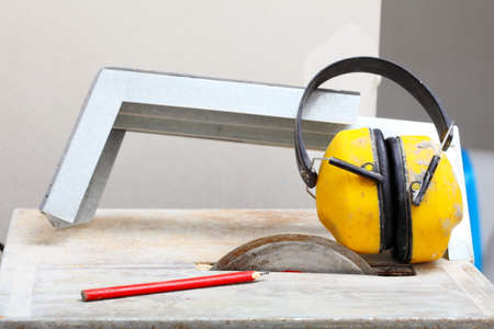 Improvement renovation at home. Construction site work tools saw blades cutter to cut tile,...