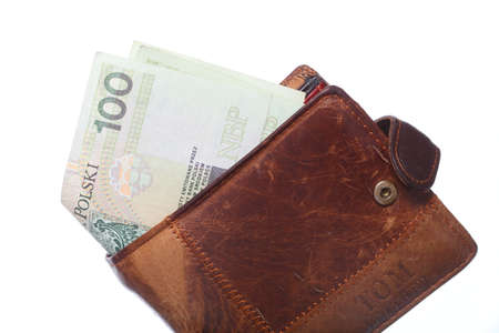 Economy and finance. Wallet with money paper currency polish zloty banknote isolated on white の写真素材