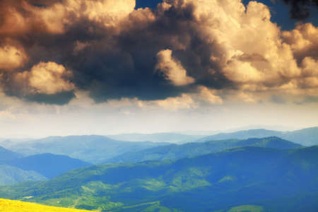 Hills beautiful summer landscape in the mountains dark sky with clouds Bieszczady Polandの写真素材