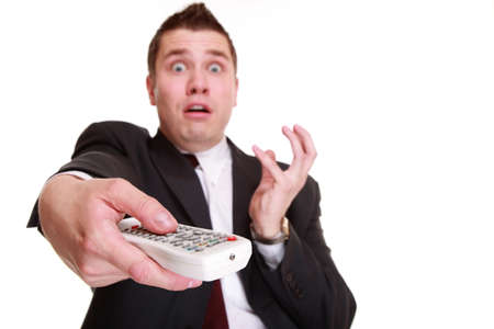 Zapping concept - man emotional face with remote control changing channel, isolated on white