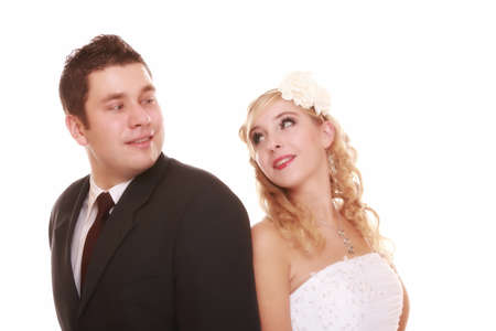 Wedding day. Portrait of happy bride and groom on white backgroundの写真素材
