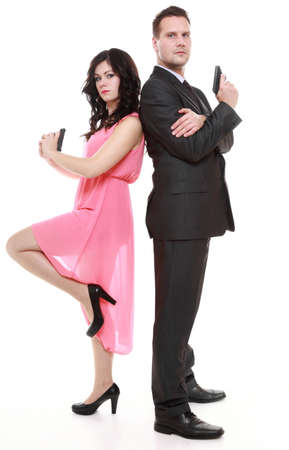 man detective secret agent criminal and sexy spy woman with gun. Isolated on white の写真素材